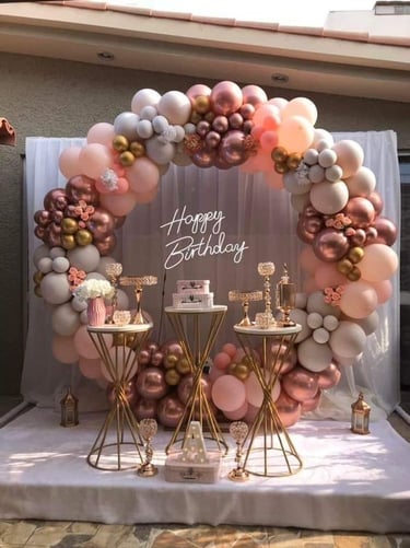 a birthday party with balloons and balloons