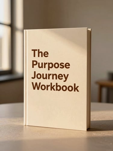 A high-quality book cover mockup of 'The Purpose Journey Workbook' standing upright against a clean neutral background, warm editorial lighting