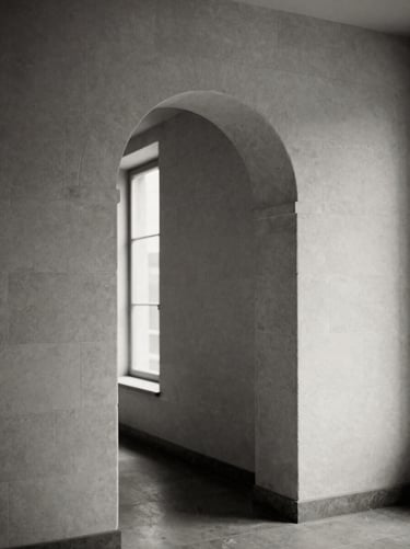 Minimalist black and white architectural detail of a solitary stone archway, soft directional light, high contrast, quiet museum atmosphere