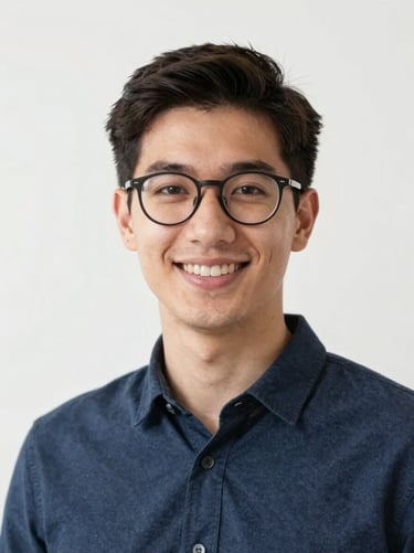 Professional headshot of a young adult Italian male professional, glasses, friendly expression, clean lighting, 35mm