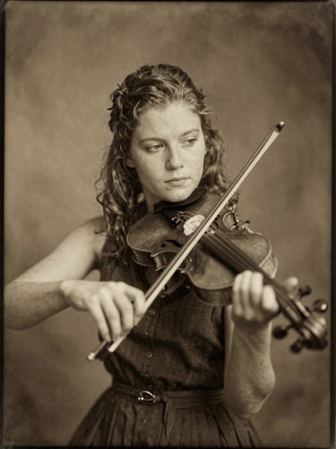 Environmental portrait of Hattie playing a 1910 fiddle, warm sepia tintype style, high-contrast lighting.