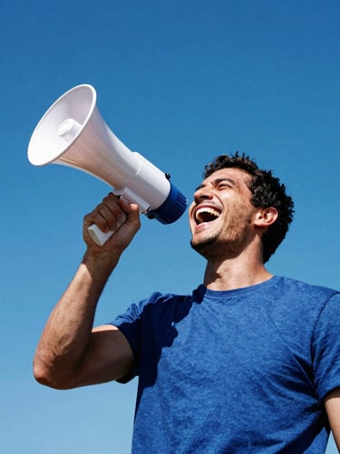 Candid portrait of a man laughing, holding a megaphone, high-contrast outdoor daylight, energetic composition.