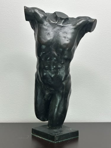 a sculpture of a mans torso