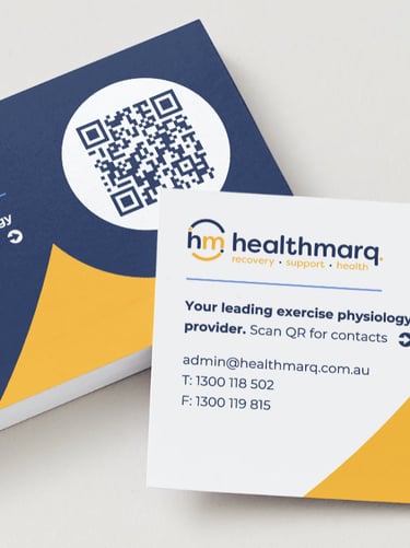 Modern Healthmarq exercise physiology business cards featuring a scannable QR code and contact details.