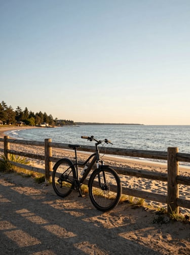 An e-bike leaning against a rustic wooden fence overlooking Prince Edward County sandy shores, golden-hour light.