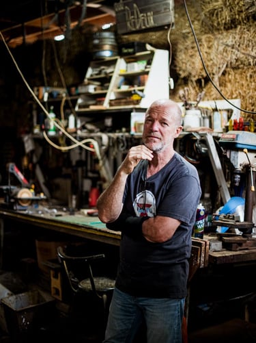 portrait of Jan Vingerhoets in workshop by Claire Gunn