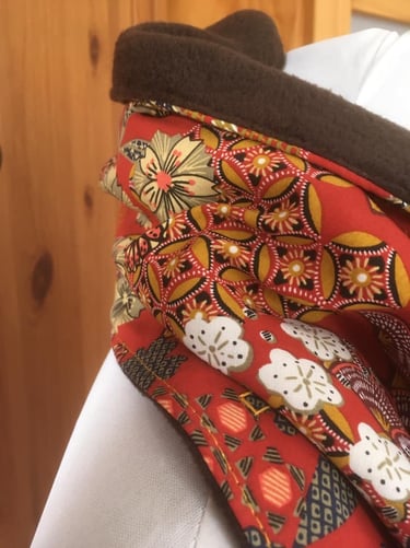 Comment fermer le col cache cou