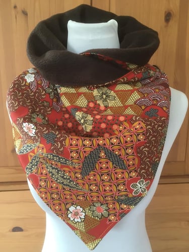 Comment fermer le col cache cou