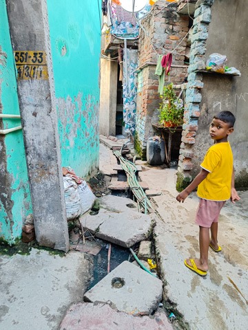 oung boy in Delhi slum area