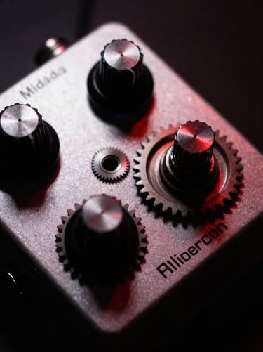 High-contrast close-up of metallic analog gears and hands on a distortion pedal, harsh spotlighting, deep shadows, crimson undertones.