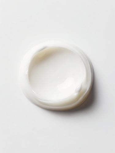 Close up of smooth white cosmetic cream swirl, soft studio light, clean aesthetic, 85mm