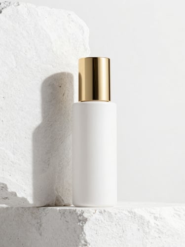 Elegant minimalist cosmetic bottle on a textured white stone, sharp architectural shadows, gold accents, 85mm