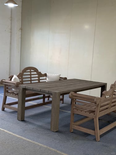Outdoor wooden bench and dining table set, showing comfortable seating for a simple garden or patio 