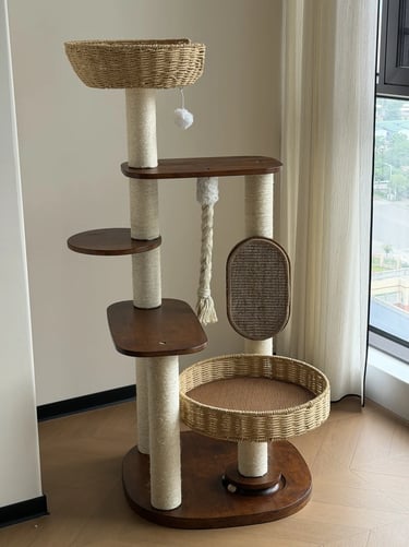 Tall freestanding cat tree with woven resting baskets, sisal scratching posts and wooden platforms n
