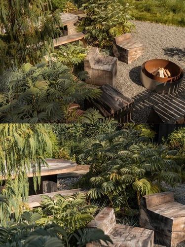 Layered garden design with wood, stone, gravel, plants and weathered metal, creating a relaxed natur