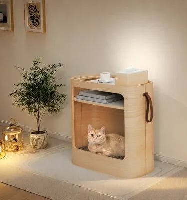 Compact wooden cat cabinet with a small entrance, designed to blend naturally into a warm modern liv