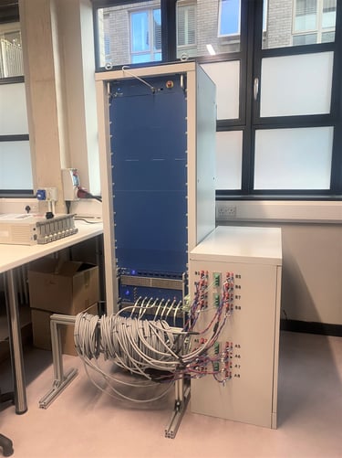 Battery cycling containment enclosure