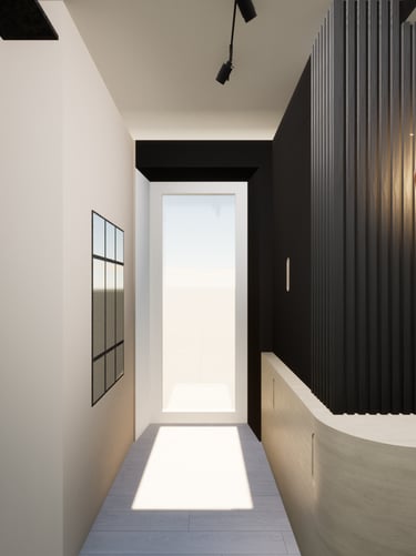 Image après transformation de l'espace d'entrée avec un mobilier sur mesure noir et bois