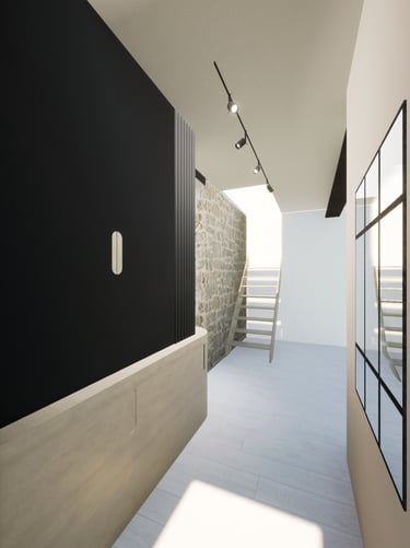 Image du projet de transformation de l'espace d'entrée avec un mobilier sur mesure noir et bois