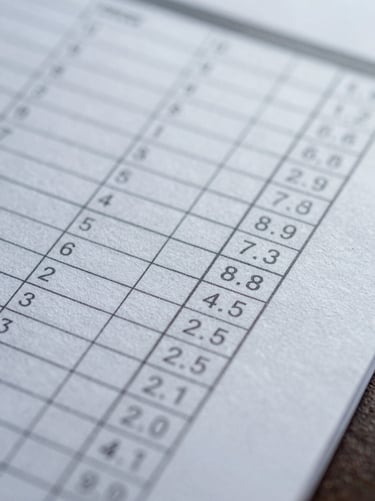Macro shot of a high-quality textured paper document with financial columns, minimal and elegant, cool corporate lighting.