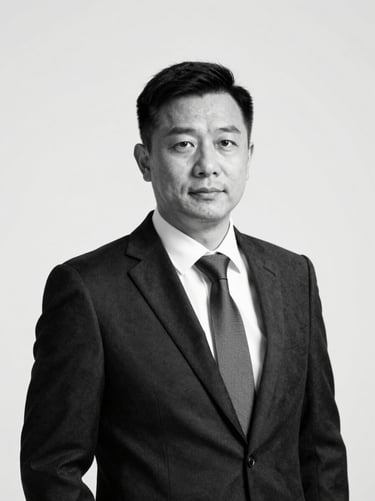 High-contrast black and white portrait of a technical operations director, sharp studio lighting, elegant professional style