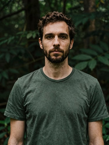 Sober portrait of a male somatic therapist in natural light, organic textures, deep green and sand tones, 35mm lens