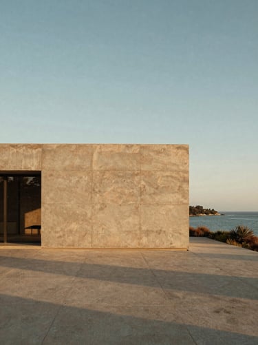 Minimalist architectural elevation of a monolithic concrete homestead overlooking a coastal bay, warm travertine tones.