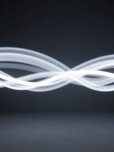 An abstract, long-exposure shot of light trails in a dark room, creating ethereal white ribbons of movement against a solid #0A0A0C background.