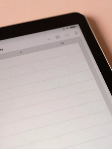 Macro shot of a minimalist digital planner on an iPad screen, soft rose background, warm golden-hour light