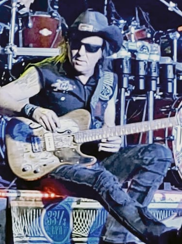 Erik Turner during a Warrant concert with his Tumbleweed "Mojo Machine."