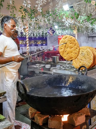 Hot and crispy Nasirabad ka Kachora being freshly fried at Kota Dussehra Mela.