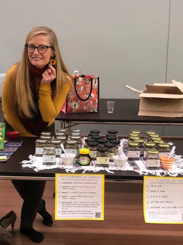 Lucy's Seeds 'N' Things stall at a local market, showcasing handcrafted, healthy snacks