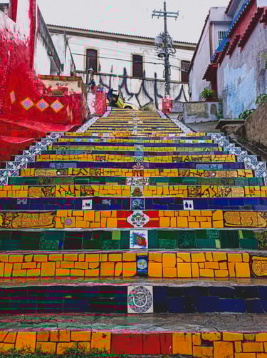 a staircase case with colorful painted steps leading up to a stairway, Selaròn, Rio de Janeiro