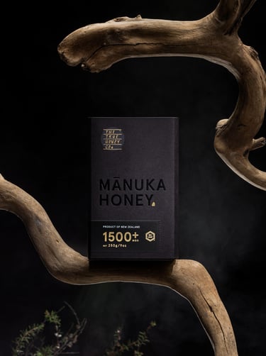 Product photography - box of honey balanced on a branch