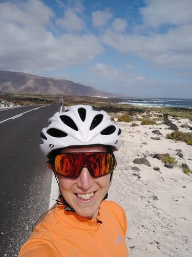 a women cycling near Orzola in Lanzarote