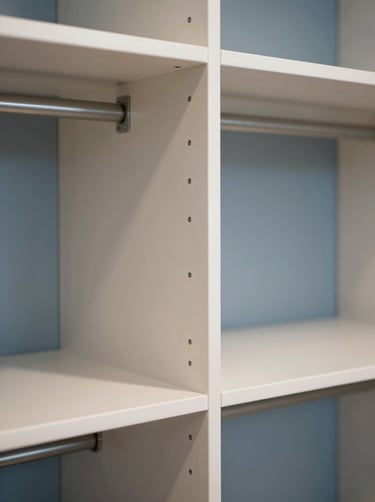 Detailed 3D render of a custom closet system. Focus on joinery and functional design, soft white and muted blue tones, elegant and technical presentation.