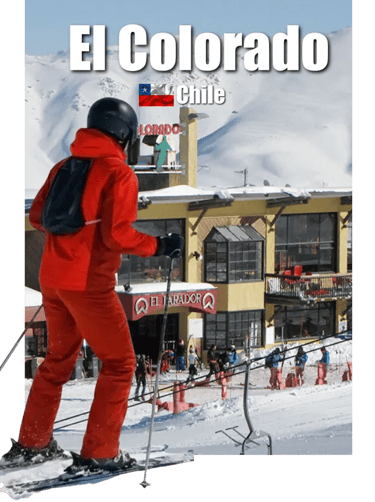 Skier in red suit descending a snowy slope at El Colorado Ski Resort, Chile, with a view the base