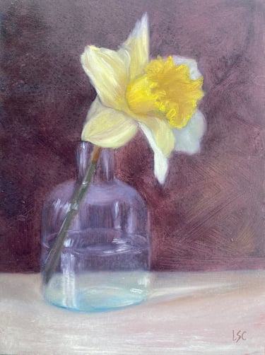 An original oil painting of a single daffodil in a small glass vase