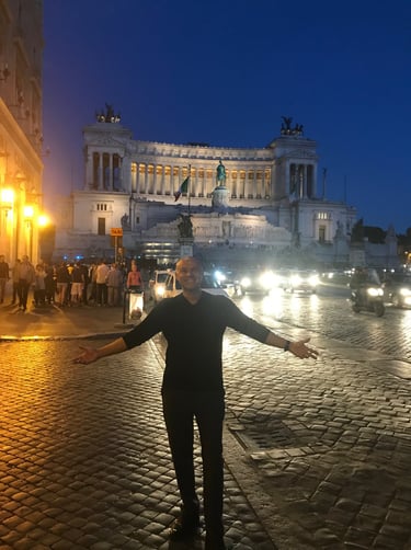Mark Bulmer standing in front of a building in Rome