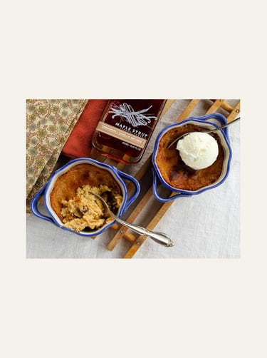 Runamok Maple Syrup near two containers with dessert