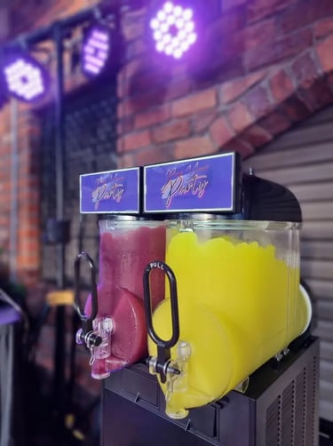 Red and yellow slushie frozen and ready in the slushie machine at event in Capalaba.