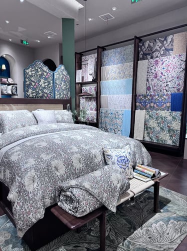 William Morris-inspired interior featuring botanical patterns, natural materials, and traditional Arts and Crafts design.