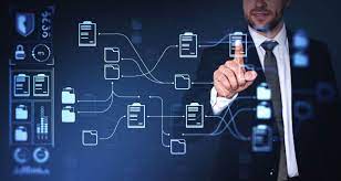 a man in a suit and tie is holding a cell phone