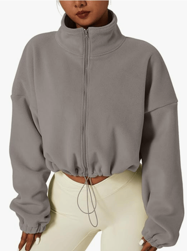 light brown/grey coat with high neck and bungie bottom