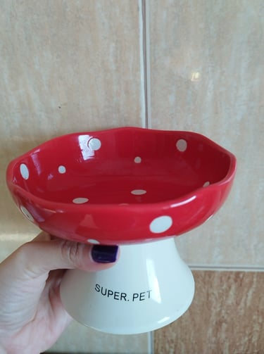 Red mushroom-shaped elevated cat bowl with tilted design, whisker-friendly, dishwasher safe 