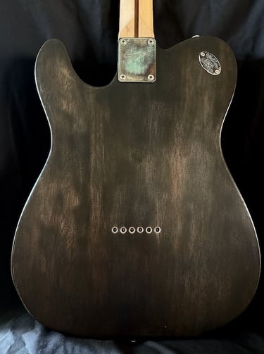 Sobek's Tele is a custom Telecaster guitar using dark industrial aesthetics back view