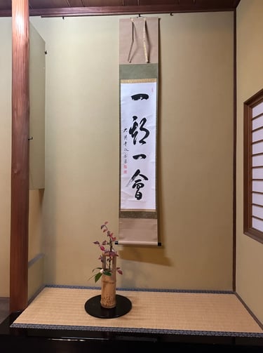 Calligraphy scroll displayed in a traditional Japanese tea room