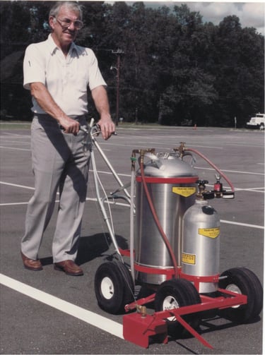 painting a parking lot using a model 350 nitrogen parking lot paint striping machine