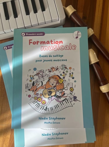 a music book with a keyboard and a recorder