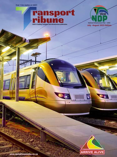 two trains are parked at a train station